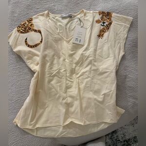 Stitch and feather tiger tee